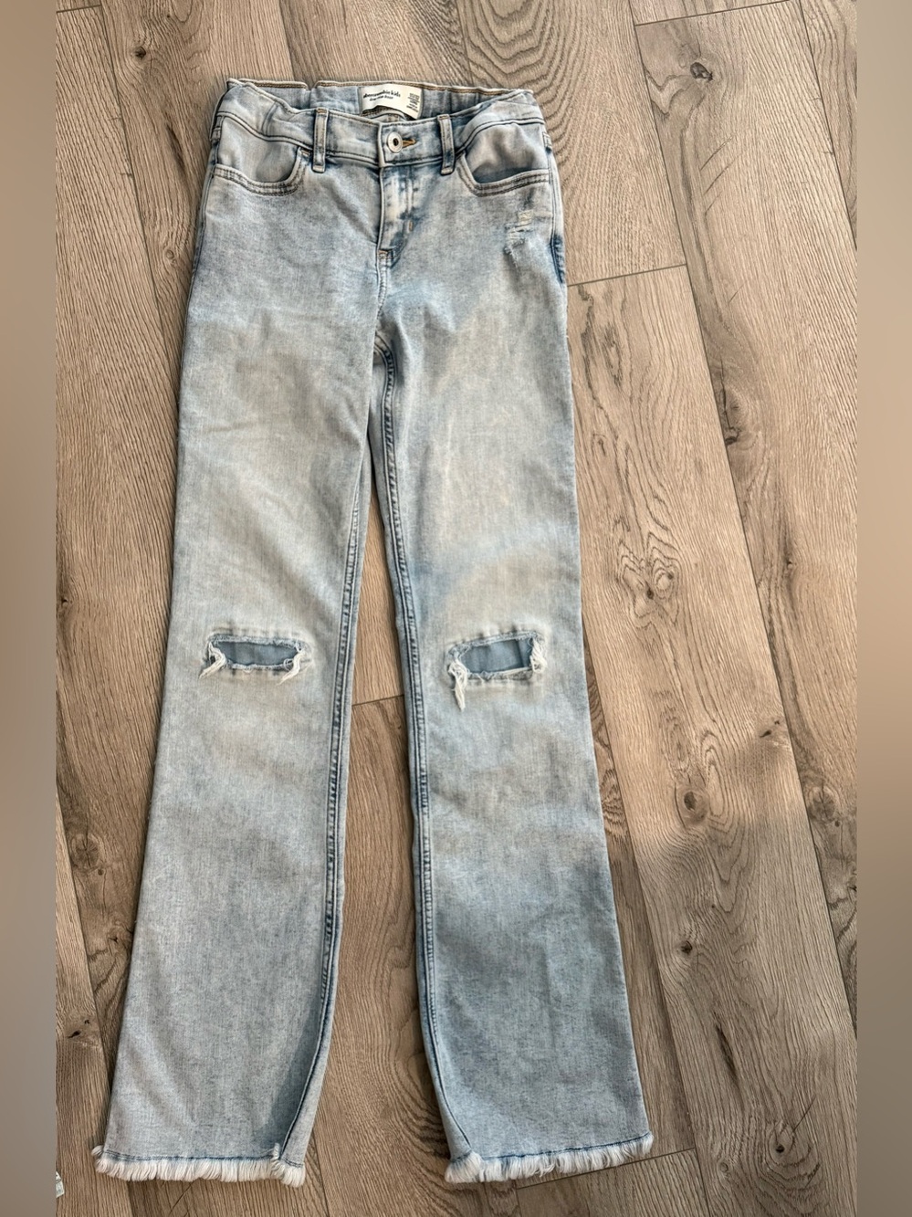 Abercrombie kids Light Blue Low Rise Boot Cut Jeans with Knee Rips